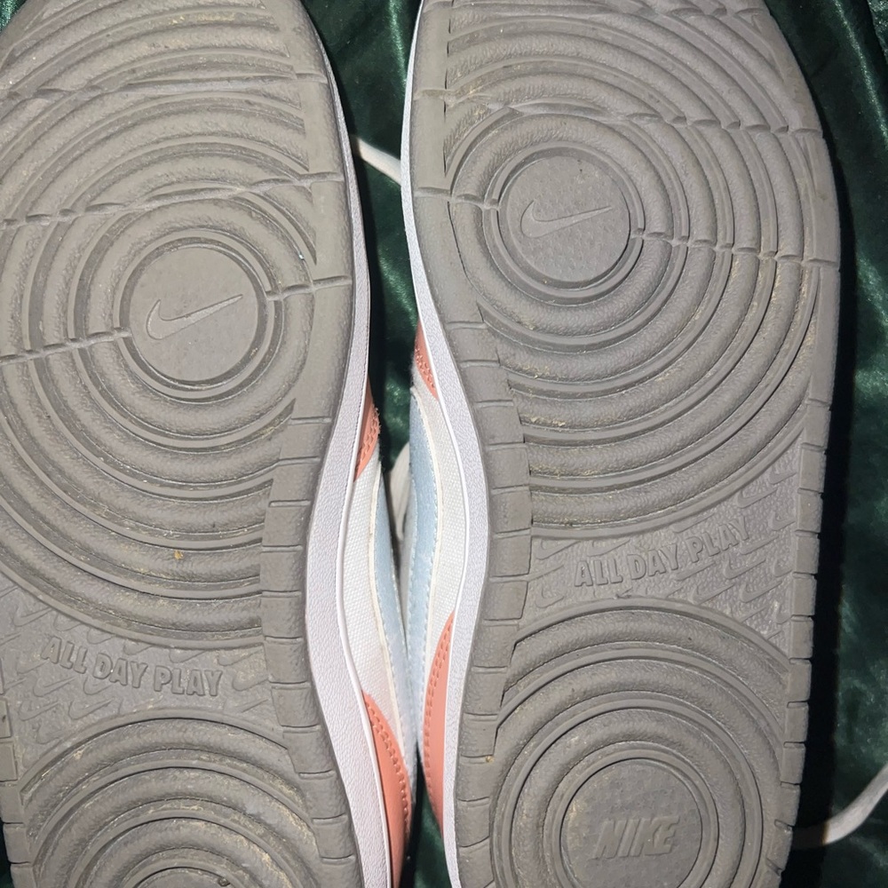 Nike size 4.5 girls. Color is peach and white.